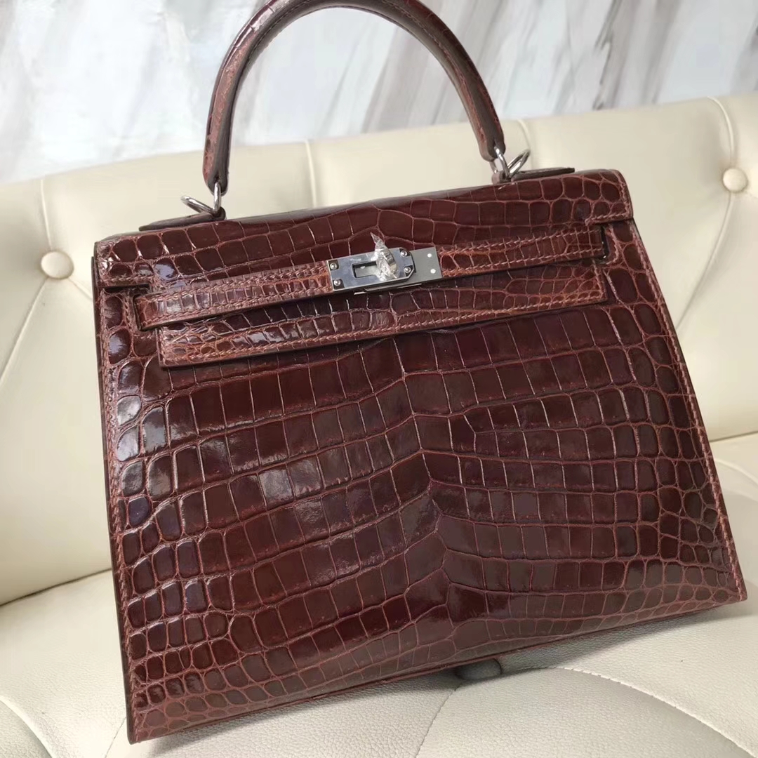 Hermès(爱马仕)kelly25cm Crocodile shiny 亮面鳄鱼 ck31 蜜糖棕 miel 银扣-拉尔森鳄鱼皮具定制 - 爱马仕包包官网 Hermès(爱马仕)kelly25cm Crocodile shiny 亮面鳄鱼 ck31 蜜糖棕 miel 银扣