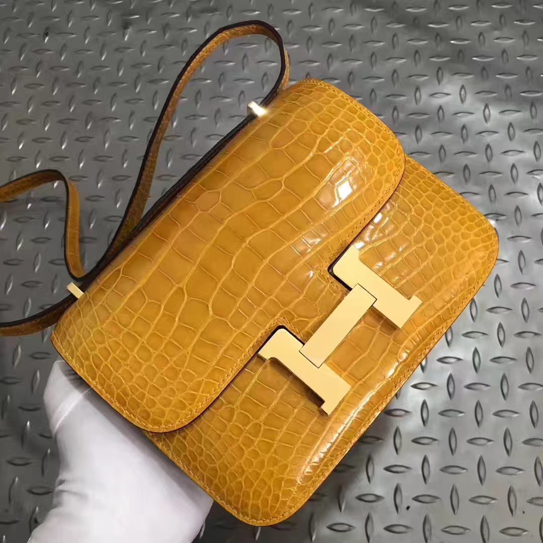 Hermès（爱马仕）Constance 空姐包 亮面鳄鱼9D 琥珀黄 ambre 金扣 18cm