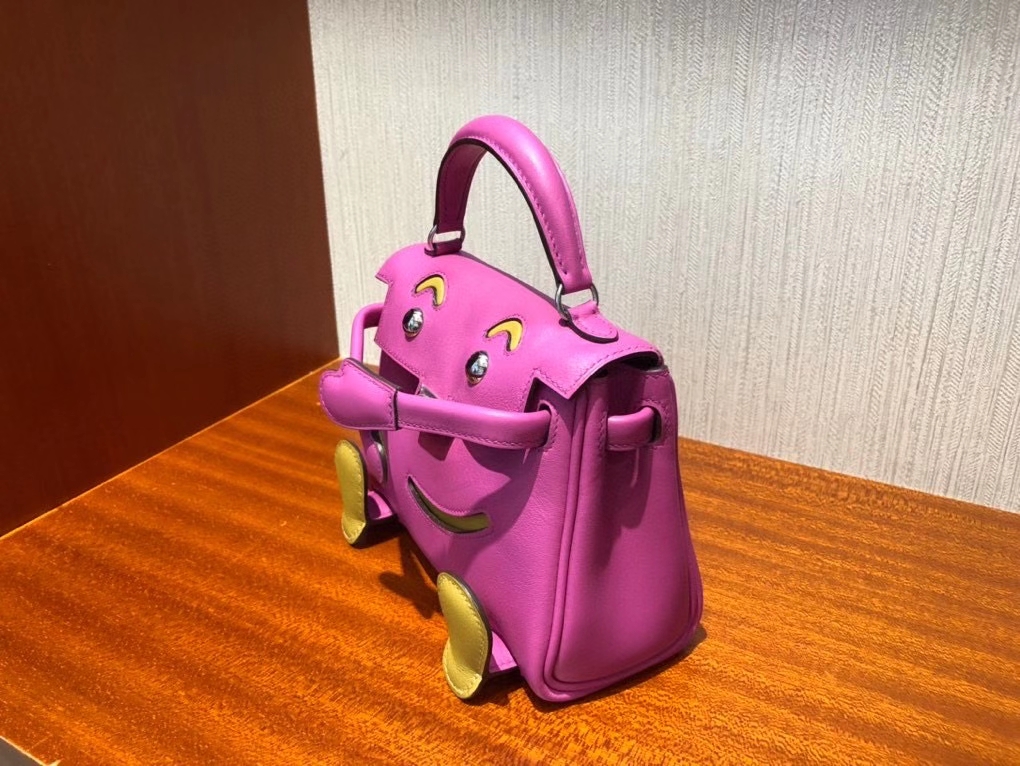 Hermès（爱马仕）Kelly doll swift 玉兰粉拼芝麻黄 银扣