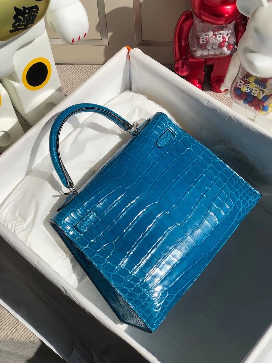 Hermès(爱马仕)Kelly 25cm Crocodile shiny 亮面鳄鱼 7w 伊兹密尔蓝 银扣 顶级手缝 现货-拉尔森鳄鱼皮具定制 - 爱马仕包包官网 Hermès(爱马仕)Kelly 25cm Crocodile shiny 亮面鳄鱼 7w 伊兹密尔蓝 银扣 顶级手缝 现货