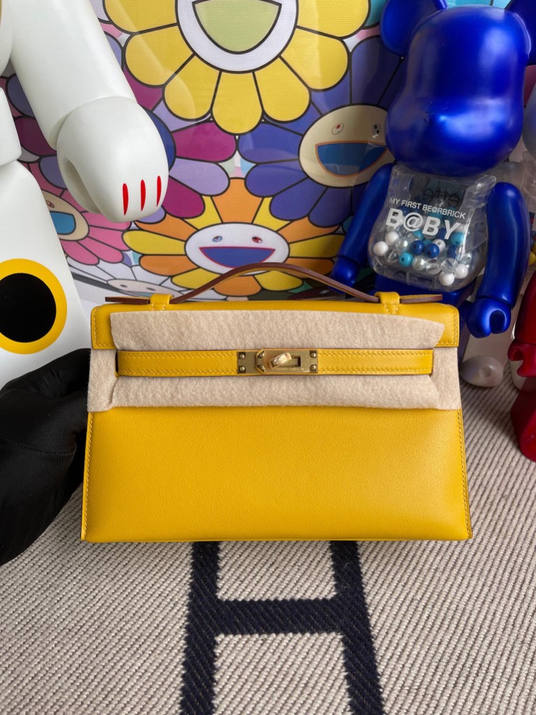 Hermès（爱马仕）Mini kelly pochette Swift 9D 琥珀黄 Ambre 金扣 22cm 手拿包 晚宴包