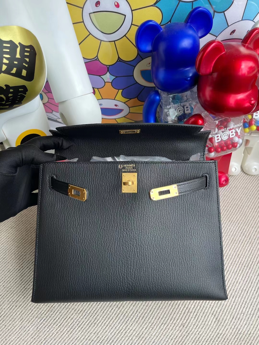 Hermès（爱马仕）Kelly 凯莉包 Chevre Ck89 黑色 内拼 i6 极致粉 拉丝金扣 25cm