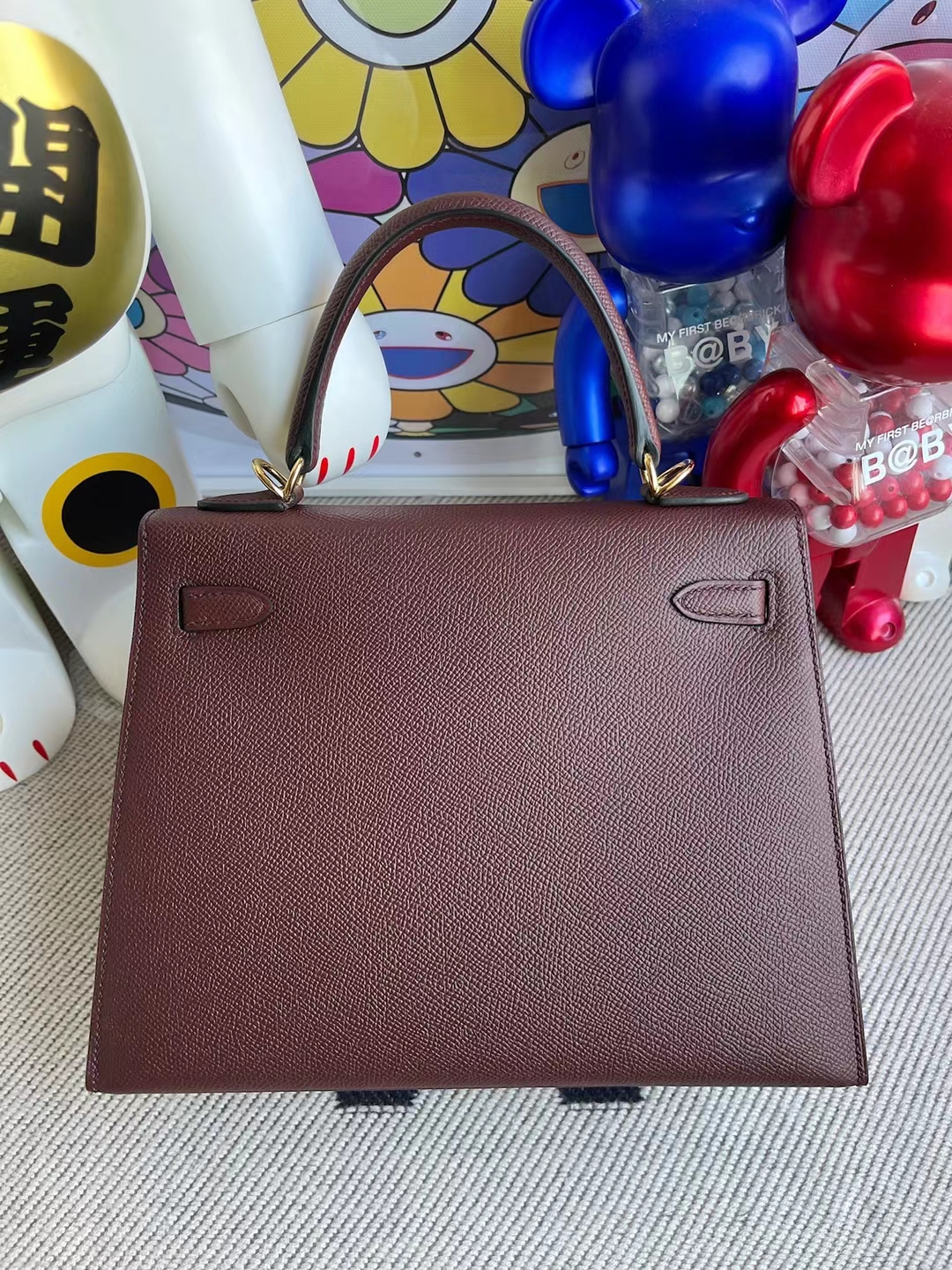 Hermès(爱马仕)Kelly 凯莉包 Epsom Ck57 波尔多酒红 金扣 25cm-拉尔森鳄鱼皮具定制 - 爱马仕包包官网 Hermès(爱马仕)Kelly 凯莉包 Epsom Ck57 波尔多酒红 金扣 25cm