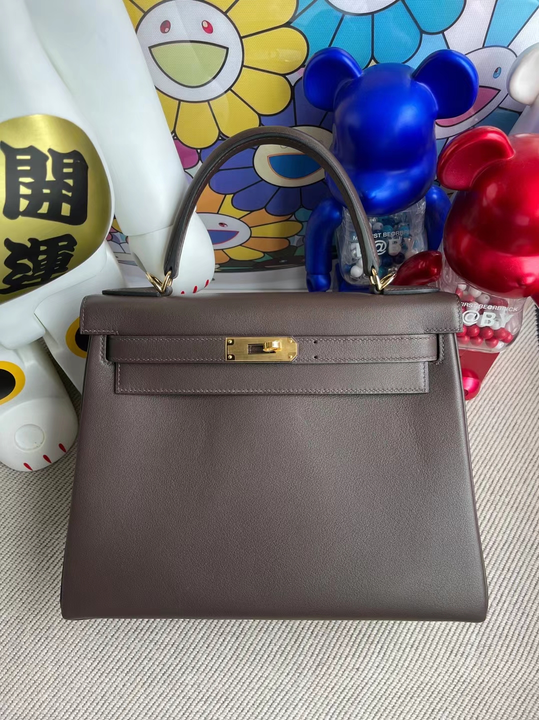 Hermès（爱马仕）Kelly 凯莉包 Swift Ck47 巧克力 金扣 28cm 订制