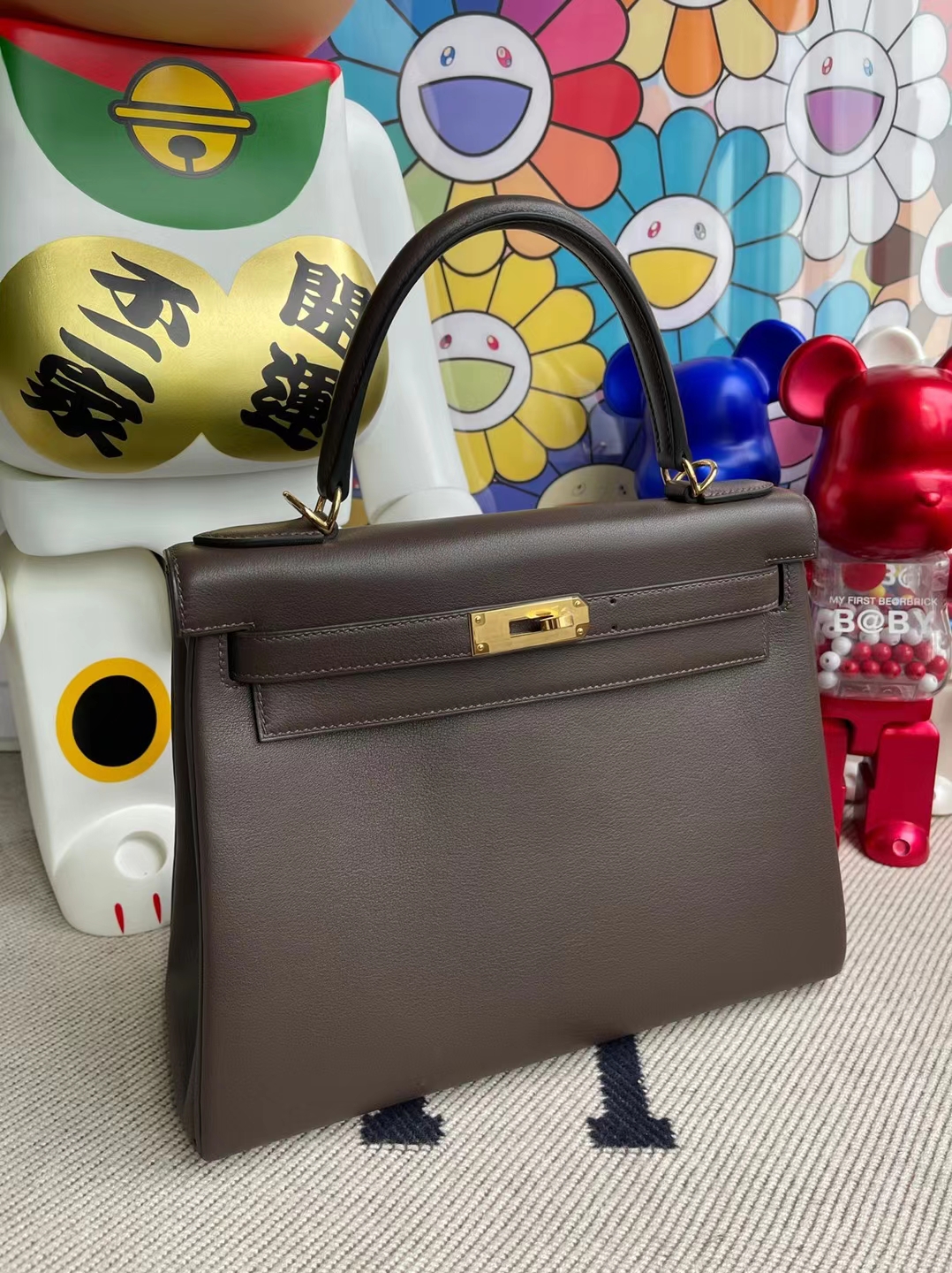 Hermès（爱马仕）Kelly 凯莉包 Swift Ck47 巧克力 金扣 28cm 订制