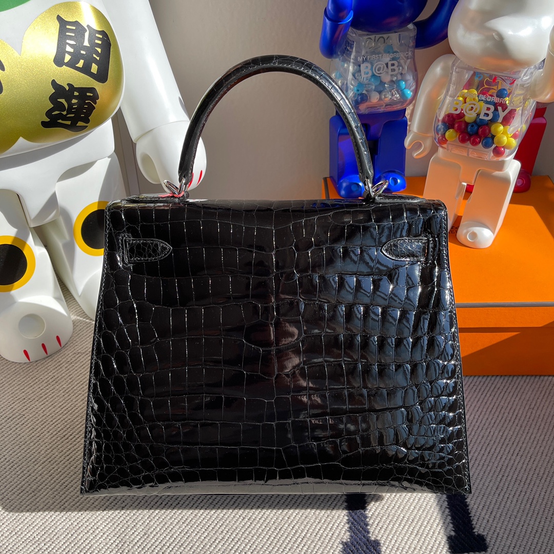 Hermès(爱马仕)Kelly 凯莉包 Crocodile shiny 亮面鳄鱼 ck89 黑色 noir 银扣 拱珠皮 28cm-拉尔森鳄鱼皮具定制 - 爱马仕包包官网 Hermès(爱马仕)Kelly 凯莉包 Crocodile shiny 亮面鳄鱼 ck89 黑色 noir 银扣 拱珠皮 28cm