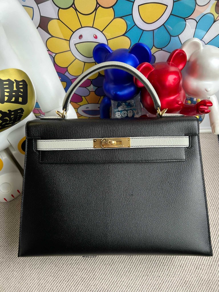 Hermès(爱马仕)Kelly 凯莉包 Chevre 山羊皮 黑色 拼 海鸥灰 金扣 32cm 顶级手缝 现货-拉尔森鳄鱼皮具定制 - 爱马仕包包官网 Hermès(爱马仕)Kelly 凯莉包 Chevre 山羊皮 黑色 拼 海鸥灰 金扣 32cm 顶级手缝 现货