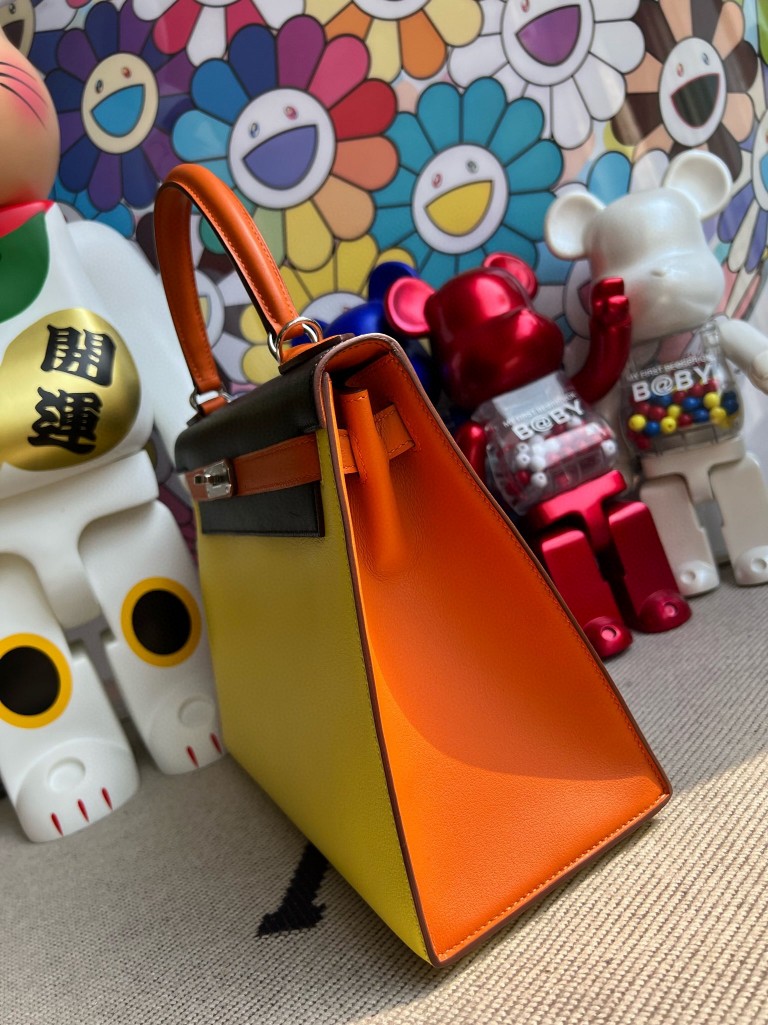 Hermès(爱马仕)Kelly 凯莉包 Swift 柠檬黄 拼 黑色 拼 火焰橙 银扣 马蹄印 28cm 顶级手缝-拉尔森鳄鱼皮具定制 - 爱马仕包包官网 Hermès(爱马仕)Kelly 凯莉包 Swift 柠檬黄 拼 黑色 拼 火焰橙 银扣 马蹄印 28cm 顶级手缝