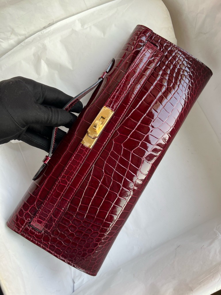 Hermès(爱马仕)Kelly cut Porosus shiny 亮面鳄鱼 ck57 波尔多酒红 金扣 31cm 顶级手缝 手拿包 晚宴包-拉尔森鳄鱼皮具定制 - 爱马仕包包官网 Hermès(爱马仕)Kelly cut Porosus shiny 亮面鳄鱼 ck57 波尔多酒红 金扣 31cm 顶级手缝 手拿包 晚宴包