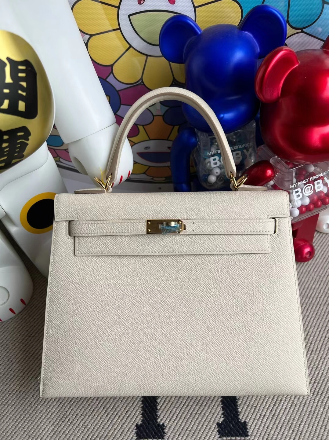 Hermès(爱马仕)Kelly 凯莉包 Epsom Ck10 奶昔白 金扣 25cm 顶级工艺 全手工缝制-拉尔森鳄鱼皮具定制 - 爱马仕包包官网 Hermès(爱马仕)Kelly 凯莉包 Epsom Ck10 奶昔白 金扣 25cm 顶级工艺 全手工缝制