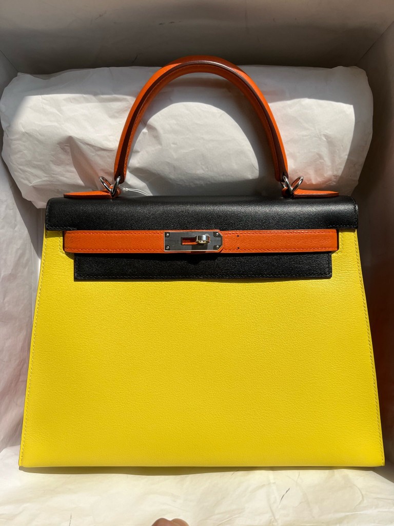 Hermès(爱马仕)Kelly 凯莉包 Swift 柠檬黄 拼 黑色 拼 火焰橙 银扣 马蹄印 28cm 顶级手缝-拉尔森鳄鱼皮具定制 - 爱马仕包包官网 Hermès(爱马仕)Kelly 凯莉包 Swift 柠檬黄 拼 黑色 拼 火焰橙 银扣 马蹄印 28cm 顶级手缝