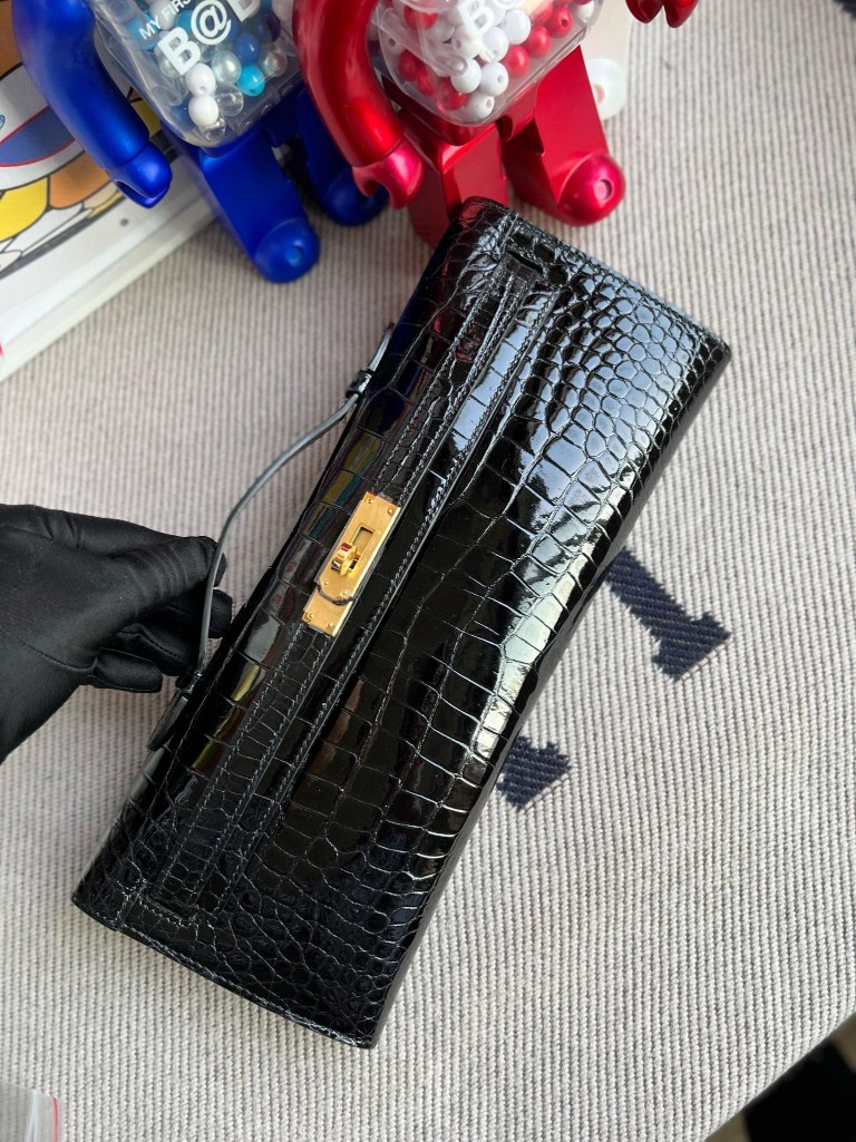 Hermès(爱马仕)Kelly cut Porosus shiny 亮面鳄鱼 ck89 黑色 Noir 金扣 31cm 顶级手缝 手拿包 晚宴包-拉尔森鳄鱼皮具定制 - 爱马仕包包官网 Hermès(爱马仕)Kelly cut Porosus shiny 亮面鳄鱼 ck89 黑色 Noir 金扣 31cm 顶级手缝 手拿包 晚宴包