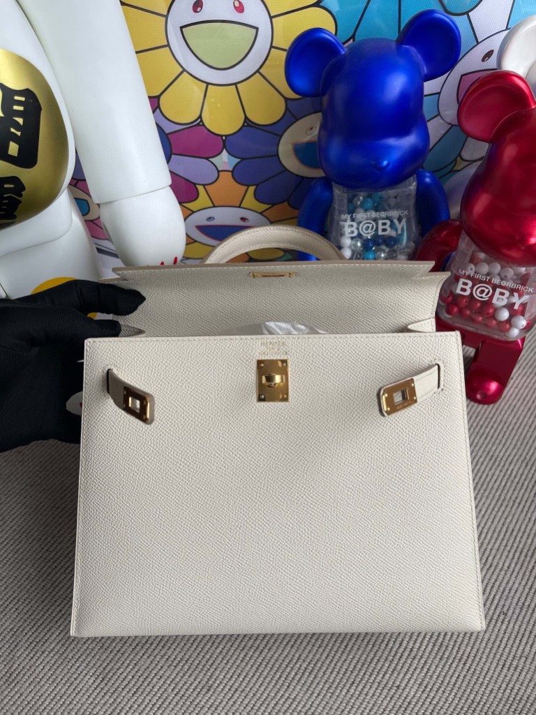 Hermès(爱马仕)Kelly 凯莉包 Epsom 原厂掌纹皮 ck10 奶昔白 Craie 金扣 25cm 顶级手缝-拉尔森鳄鱼皮具定制 - 爱马仕包包官网 Hermès(爱马仕)Kelly 凯莉包 Epsom 原厂掌纹皮 ck10 奶昔白 Craie 金扣 25cm 顶级手缝