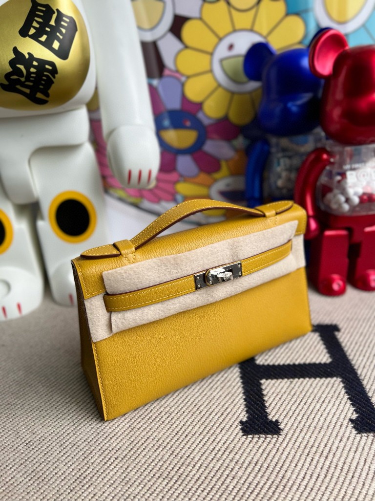 Hermès（爱马仕）Mini pochette Chevre 山羊皮 9D 琥珀黄 Ambre 银扣 22cm 顶级手缝