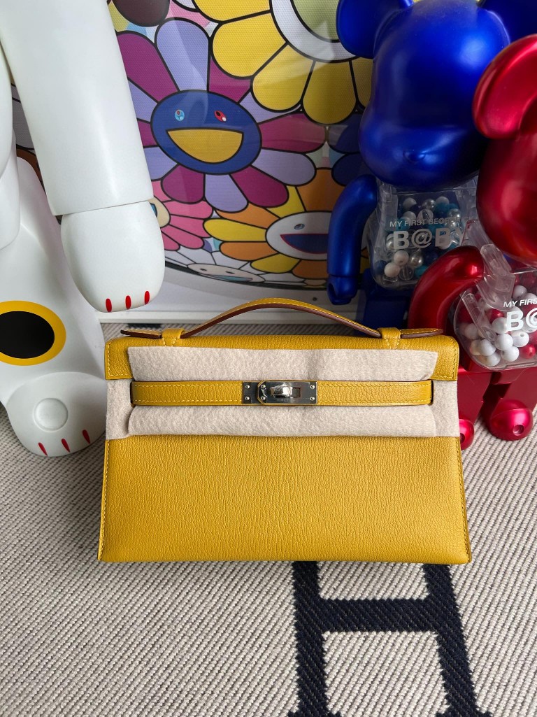 Hermès（爱马仕）Mini pochette Chevre 山羊皮 9D 琥珀黄 Ambre 银扣 22cm 顶级手缝