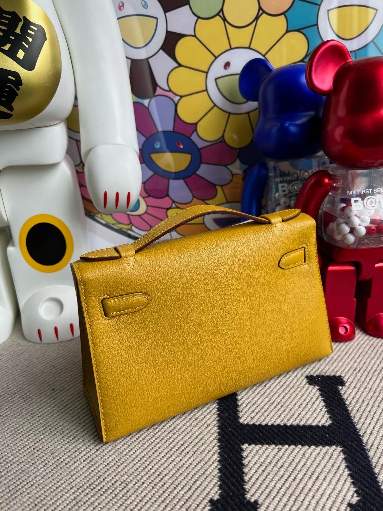 Hermès（爱马仕）Mini pochette Chevre 山羊皮 9D 琥珀黄 Ambre 银扣 22cm 顶级手缝